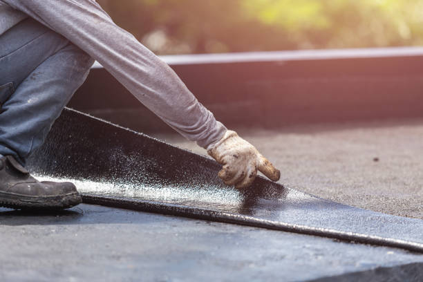 Professional Waterproofing technician working in Annandale, MN